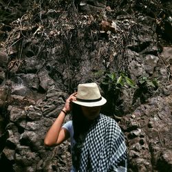 Woman standing on rock