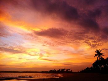 Scenic view of sea against dramatic sky