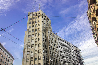 Low angle view of skyscraper against sky