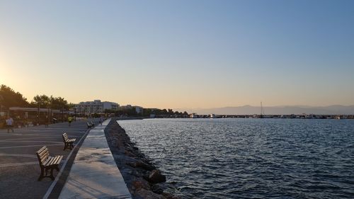 Scenic view of sea against clear sky during sunset