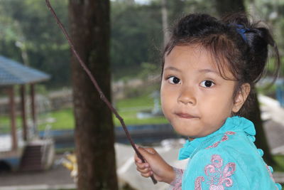 Portrait of cute girl looking away