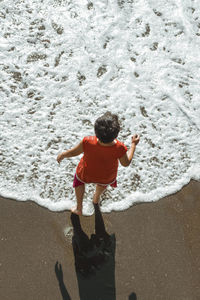 Full length of boy on beach