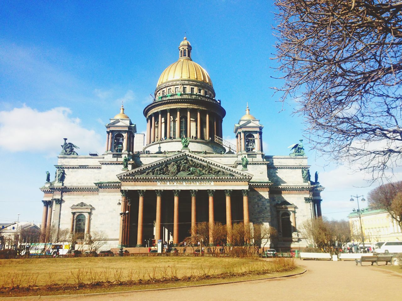 architecture, building exterior, built structure, place of worship, sky, religion, facade, spirituality, famous place, incidental people, history, travel destinations, blue, dome, tourism, travel, church, entrance, tree