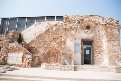 Exterior of historic building against clear sky