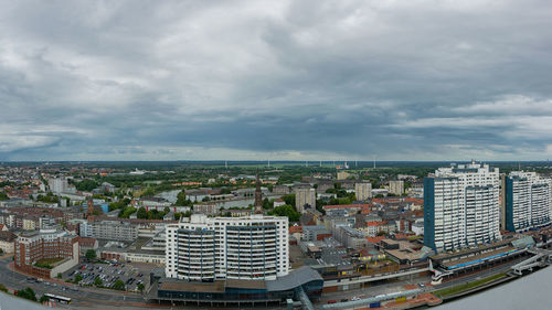 High angle view of buildings against sky in city