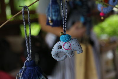 Close-up of decoration hanging for sale in market