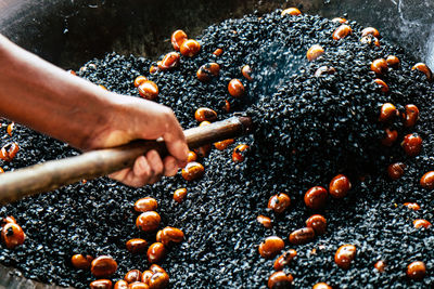 Close-up of person preparing food