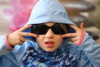 Portrait of cute boy wearing sunglasses