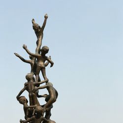 Low angle view of statue against clear sky