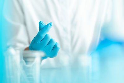 Human hand holding leaf