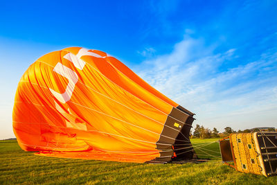 Tent on field against sky