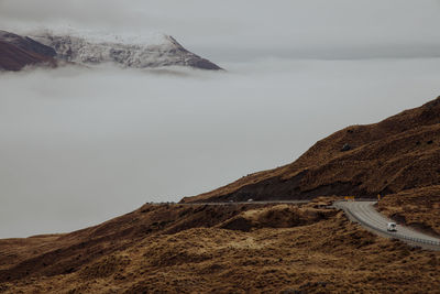 Scenic view of mountains against sky during winter