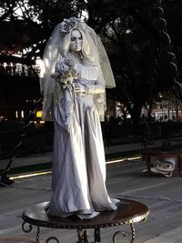 Statue against clear sky in city