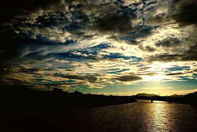 Scenic view of calm sea at sunset