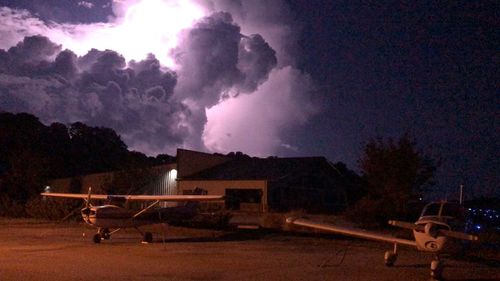 Panoramic view of trees against sky at night