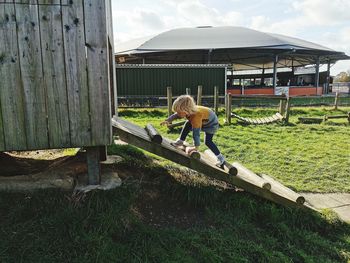 Full length of boy on field