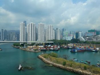 View of harbor and buildings in city
