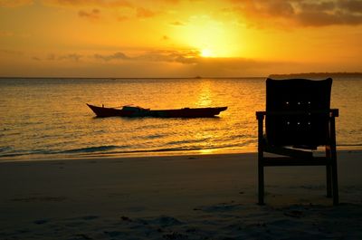 Scenic view of sea at sunset