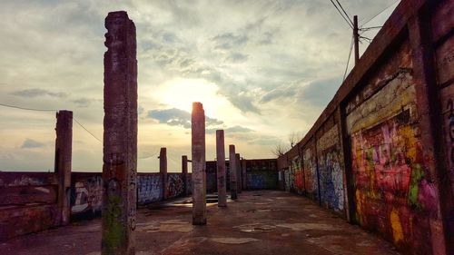 View of buildings against cloudy sky