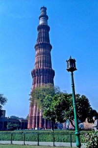 Low angle view of monument against clear blue sky