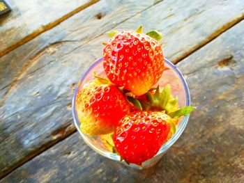 High angle view of strawberries on table