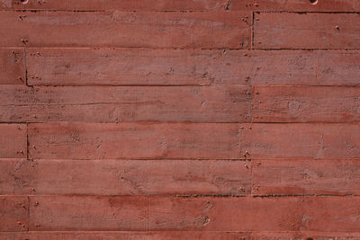 Texture of a red concrete wall texture horizontal make with wood formwork