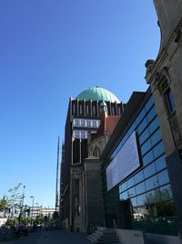 Low angle view of temple against clear blue sky