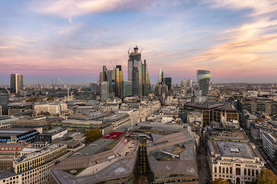 High angle view of city buildings during sunset