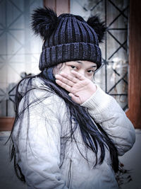 Portrait of woman covered with snow