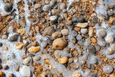 High angle view of stones on beach