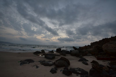 Scenic view of sea against cloudy sky