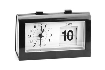 Close-up of clock over white background