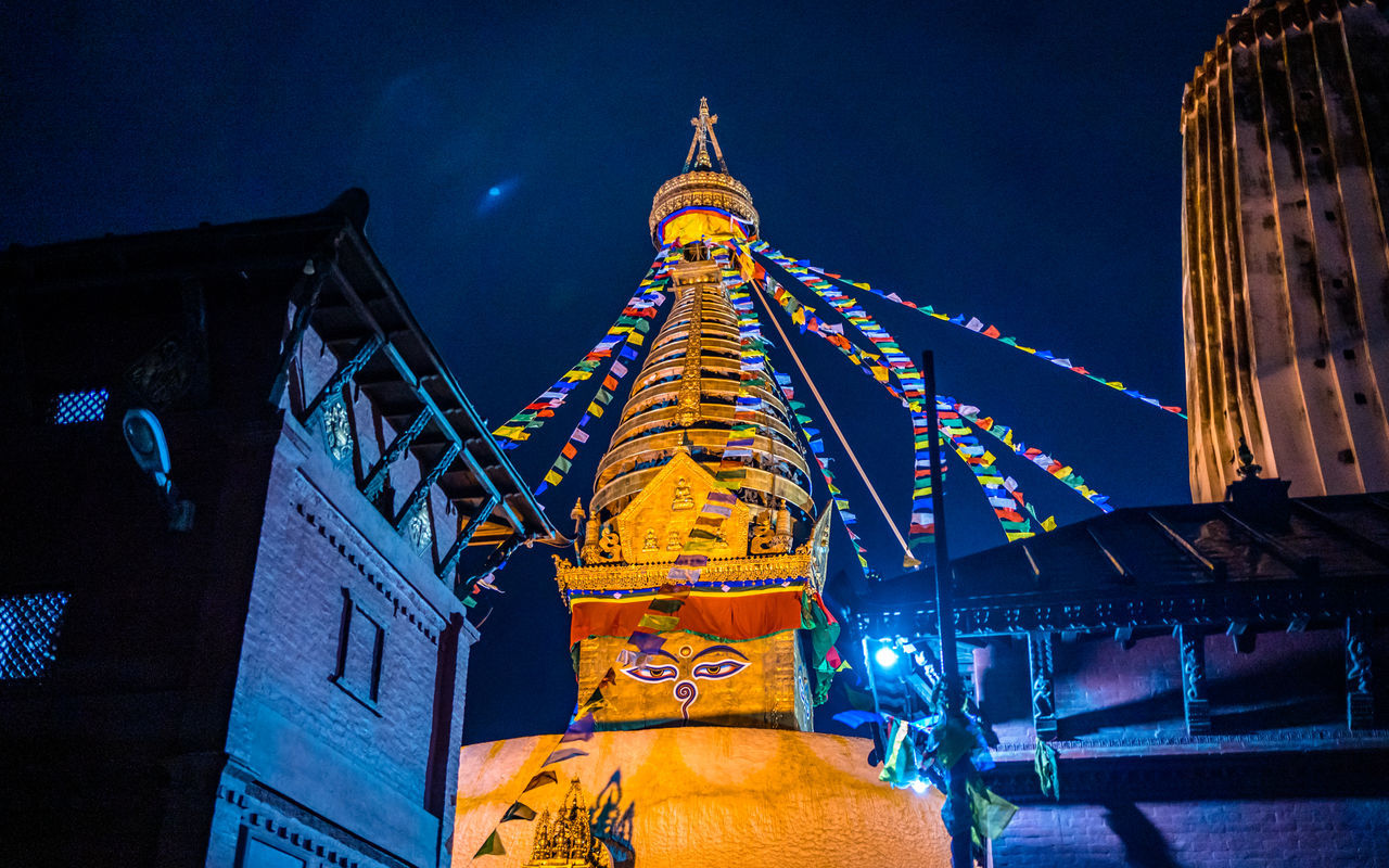 architecture, night, built structure, building exterior, travel destinations, religion, building, illuminated, belief, temple - building, landmark, history, travel, spirituality, city, no people, the past, light, decoration, sky, place of worship, tradition, nature, evening, tourism, outdoors, blue, tower, ancient, celebration, event, pagoda