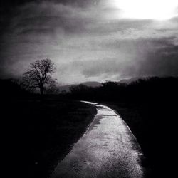 Road passing through field