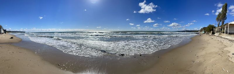 Scenic view of beach against sky