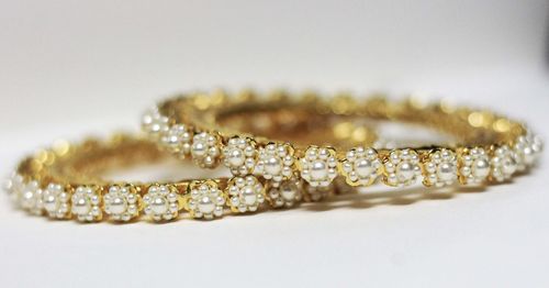 Close-up of wedding rings on white background