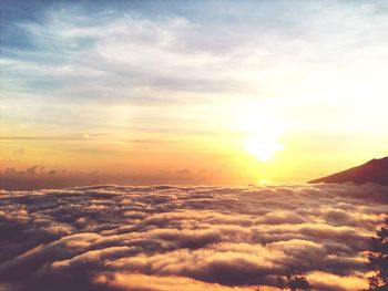 Scenic view of cloudy sky at sunset