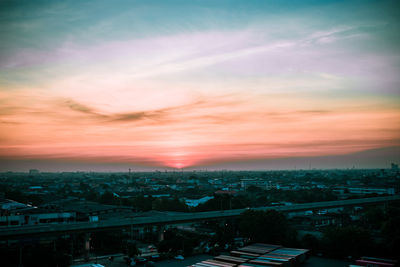 High angle view of townscape against sky at sunset