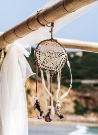 Close-up of decoration hanging outdoors