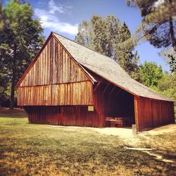 Barn on grassy field