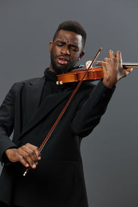 Portrait of violin against white background