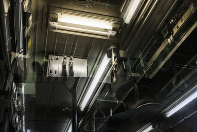 Low angle view of illuminated ceiling