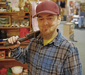 Portrait of man holding camera