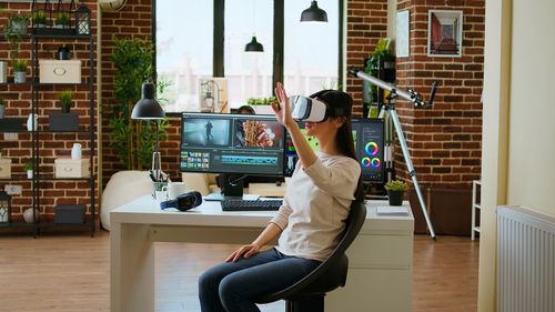 Side view of man using mobile phone while standing in city