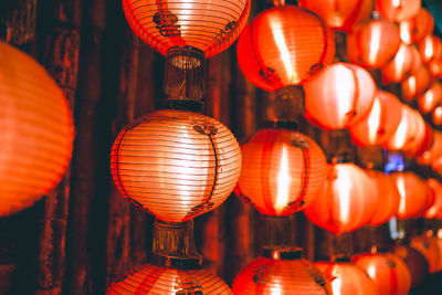 Full frame shot of illuminated lanterns hanging for sale at market