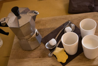 High angle view of coffee cup on table