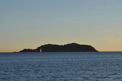 Scenic view of sea against clear sky