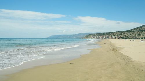 Scenic view of beach against sky