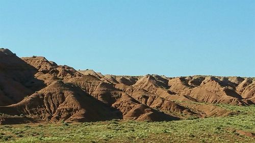 Scenic view of mountains against clear sky