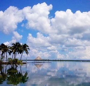 Scenic view of sea against cloudy sky